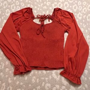 Buckle cutout top